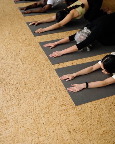 Close up of yoga practitioner doing joint mobility exercises